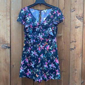 Black tropical floral romper from Belle Sky NWT sz M